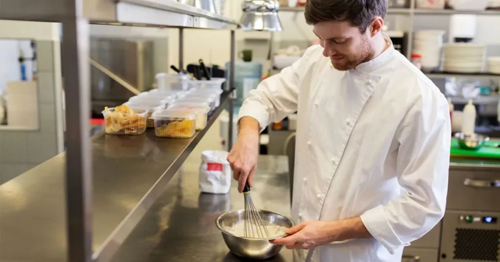 chef mixing in bowl